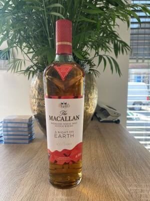 Photo of whisky bottle in cluttered surroundings